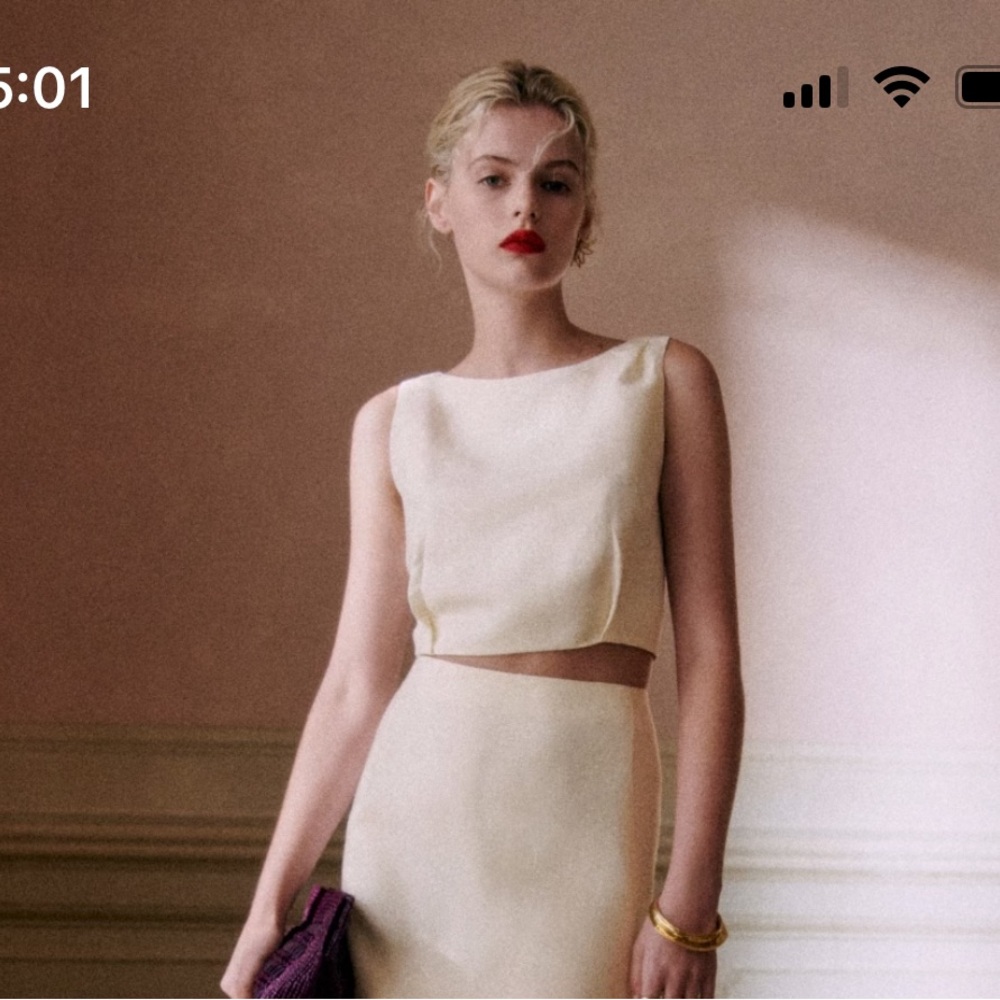 Claire blouse is ecru size 34 Sezane editions